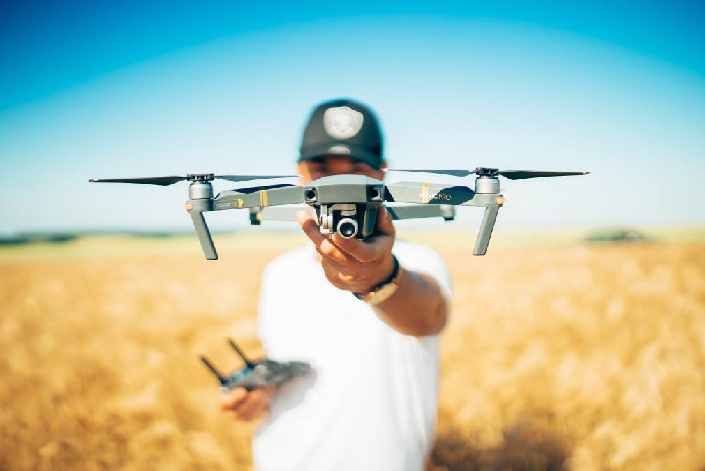 guy holding drone