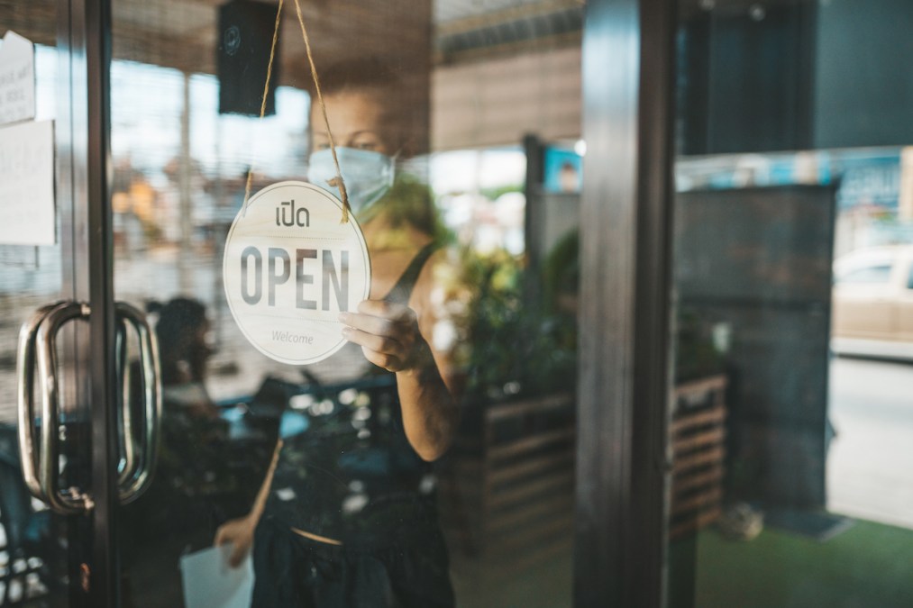 open sign on glass door