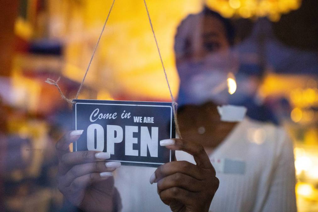 woman with open sign